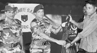ULFA militant Anshuman Bora surrenders before the Army authorities at Thakurbari in Assam