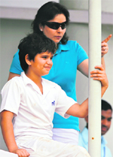 Anjali Tendulkar and son Arjun watch during the fourth day of Indias third Test against Sri Lanka in Mumbai