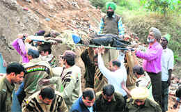 A victim being taken to hospital from the dumping site in Sector 31, Chandigarh, on Sunday.
