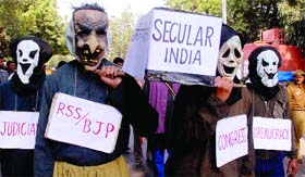 A scene of a street play organised at Jantar Mantar on the occasion of the 17th anniversary of the demolition of Babri Masjid, in New Delhi