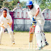 A match in progress at the 58th District Cricket League in Dehradun on Sunday. Tribune photo: Vinod Pundir 