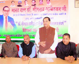 State Congress chief Yashpal Arya speaks at the Congress Bhawan in Dehradun on Sunday.