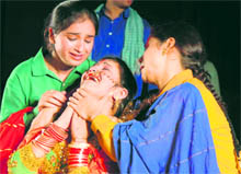 Artistes stage play Ghumayee at Abhinav Theatre in Jammu on Sunday. Tribune photo: Ananad Sharma