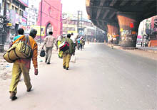 Commuters return home as government and private buses remained off road due to curfew.