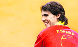 Spain's Rafael Nadal smiles during the third match of the Davis Cup Final between Spain and Czech Republic at palau Sant Jordi in Barcelona on Saturday.