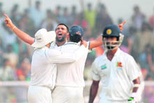 Zaheer Khan celebrates the wicket of Nuwan Kulasekara on Sunday. 