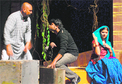 Artistes in a scene from the play Chehray at the Tagore Theatre in Chandigarh