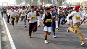 School students participate in the Ryan Maggi Minithon Road Race in Amritsar