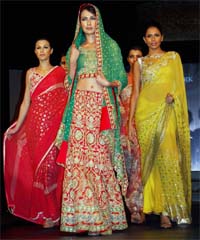 Models present a collection of Delhi-based designer Mandira Wirk at the AGA Heritage Club in Amritsar
