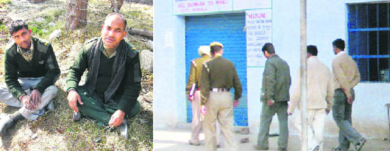 The security guards who were drugged at gunpoint; and (right) police officials inspect the scene of robbery at Kharar on Tuesday.