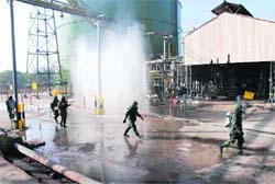 Mock fire drill in progress at National Fertilizers Limited in Nangal on Tuesday.