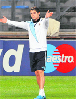 Real Madrids Cristiano Ronaldo gestures during a training session