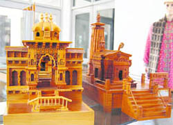 Wooden models of the Badrinath and Kedarnath temples that are being sold as souvenirs by the Uttarakhand Tourism Department.
