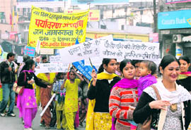 A rally on conservation of the environment being taken out in Dehradun on Wednesday