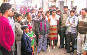 Migrants share their views with each other in Ludhiana on Wednesday.