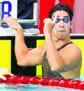Japans Takuro Fujii celebrates after winning the mens 100m butterfly swimming final at the East Asian Games in Hong Kong on Wednesday