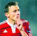 Bayern Munichs Ivica Olic gestures after scoring against Juventus during their Champion's League match in Turins Olimpic Stadium on Tuesday. Bayern won 4-1.  AFP 