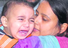 Bharti with her one-year-old son Abhi