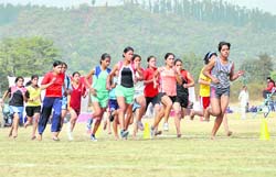 Athletes participate in the 800m race at the Inter-District Athletics Championship at Maharana Pratap Sports College, Raipur, on Thursday.