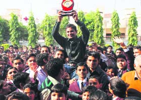 Footballer Manandeep is feted by schoolmates in Hisar after his selection for the East Bengal Football Club