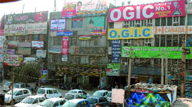  A view of the busy market having offices of immigration consultants near the ISBT in Jalandhar. 