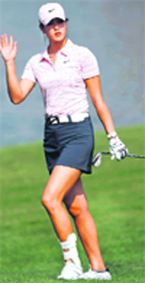 Michelle Wie of the U.S. waves during the second round of the Dubai Ladies Masters European Tour golf tournament in Dubai on Thursday. 