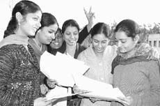 Students in a joyous mood after receiving their certificates on Friday. 