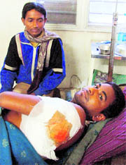 A migrant recuperates at the ESI Hospital in Ludhiana on Friday.