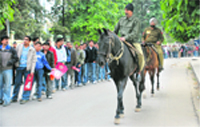 Fans line up outside the PCA Stadium at Mohali