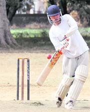A batsman hits a shot in the Beehive T20 Cricket Tournament in Dehradun on Saturday. 