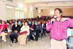 A speaker at a seminar on career counselling at MKP College in Dehradun on Saturday.