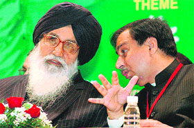 Punjab Chief Minister Parkash Singh Badal with Dr SPS Sodhi, organising chairman of the 16th national conference of the Indian Society of Oral Implantology, at the National Institute of Pharmaceutical Education and Research (NIPER) in Mohali on Sunday. 