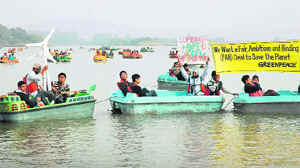 Greenpeace holds a protest rally at Sukhna Lake on Saturday. 