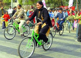Cyclists participate in a rally on the occasion of 15th UN Climate Change Summit to be held at Copenhagen, at Moolchand BRT Corridor in New Delhi