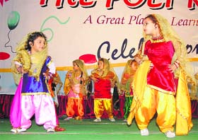 Tiny tots perform a giddha at the Poly Kids school in Dehradun