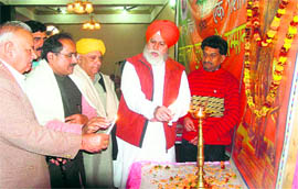 BJP MP SS Ahluwalia inaugurates a general awareness programme in Jammu on Sunday.
