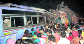 Twenty persons were killed and 25 injured when a private bus in which they were travelling collided with a truck on the national highway near Mahisrekha bridge in Howrah district on Sunday.
