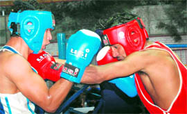A match in progress between Surinder (Punjab) and Neeraj (Himachal Pradesh) during the 17th Senior Men and 4th Women North Zone (Zonal National) Boxing Championship in Chandigarh on Monday.