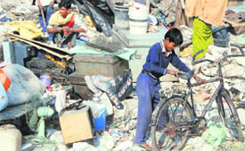 Residents look for their belongings.