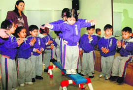 Tiny tots of British School get training in Monkeynastix in Chandigarh on Monday.