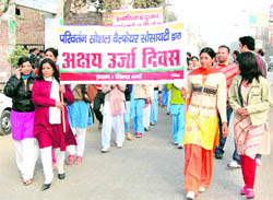 Activists of the Parivartan Social Welfare Society lead a rally of schoolchildren on the occasion of National Energy Conservation Day in Sirsa on Monday. Photo: Amit Soni 