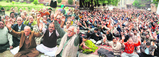 Members of the J&K Pensioners Association observe a fast in Jammu on Monday; and (right) daily wagers engaged by the PDD hold a demonstration.
