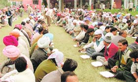Devotees partake of langar on PAU campus in Ludhiana