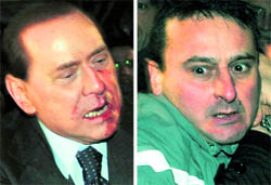 Italys Prime Minister Silvio Berlusconi (left) after he was attacked and a man apprehended in the incident, in Milan on Sunday
