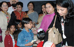 Innerwheel Club members meet the children of prisoners at Central Jail, Gumtala. 