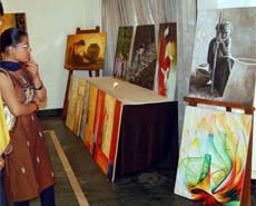 People view Vietnamese art at an exhibition in Amritsar.