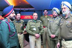 Chief of Staff, Western Command, Lieut-Gen MS Buttar (left) interacts with senior officers from central police organisations at a conference in Chandimandir on Tuesday. 