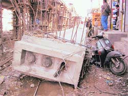 A portion of the railway overbridge that fell on the Dabwali road in Sirsa on Tuesday.