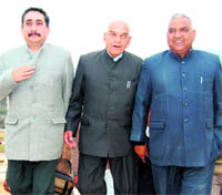 MLA Vipan Parmar, ministers ID Dhiman and Ramesh Dawala going for lunch during the winter session of the vidhan sabha at Dharamsala on Tuesday. Photo: Kamaljeet