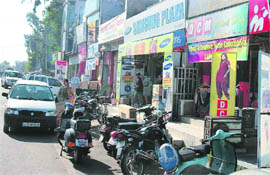 Shopkeepers at the Aspara Road have enchroached on the footpaths outside their shops, causing inconvenience to visitors.